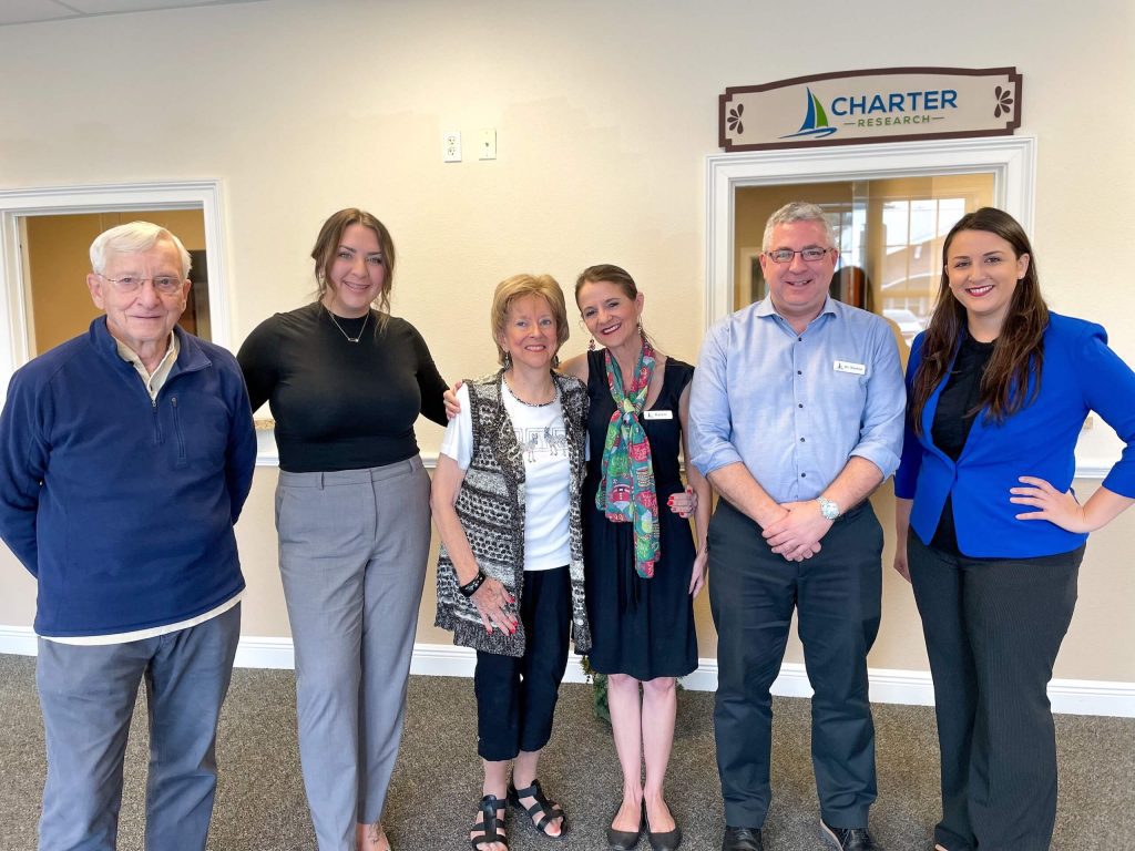 Norma and Wilhelm Hoehndorf with research professionals at Charter Research. Pictured from left to right: Wilhelm Hoehndorf, Rachael Nix (Clinical Research Coordinator), Norma Hoehndorf, Karen Schafer (Prescreen Coordinator), Dr. Jeffrey Norton, MD (Principal Investigator), and Kate Scheurich (Psychometric Rater).