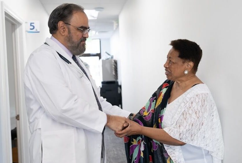 Dr. Rivera shaking patient's hand.
